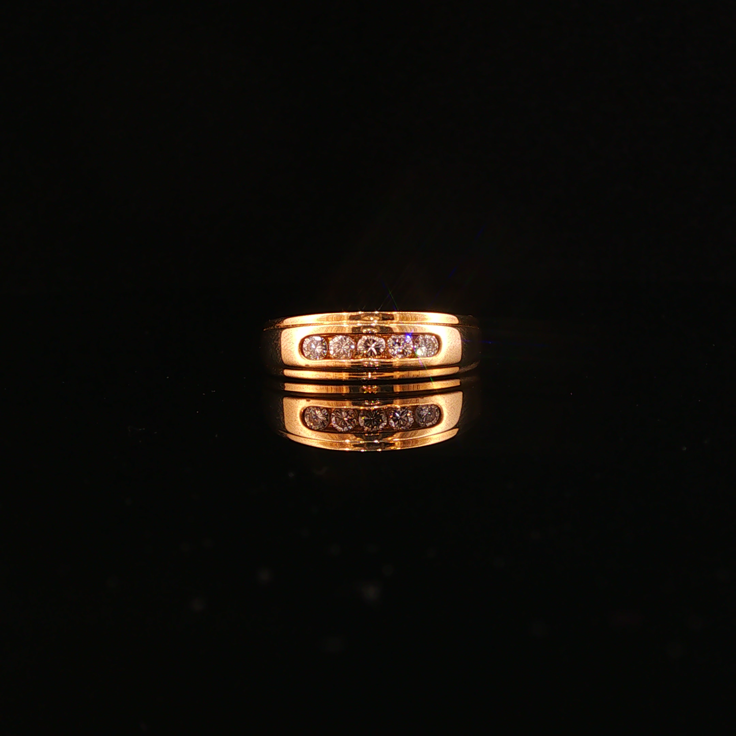 Five-Stone Diamond Channel Set Band in Yellow Gold