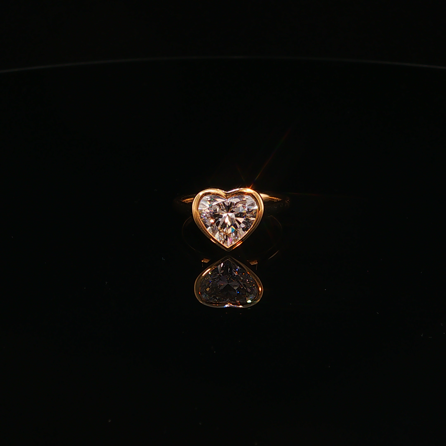 Heart-Shaped Lab Diamond Bezel Solitaire Ring in Yellow Gold