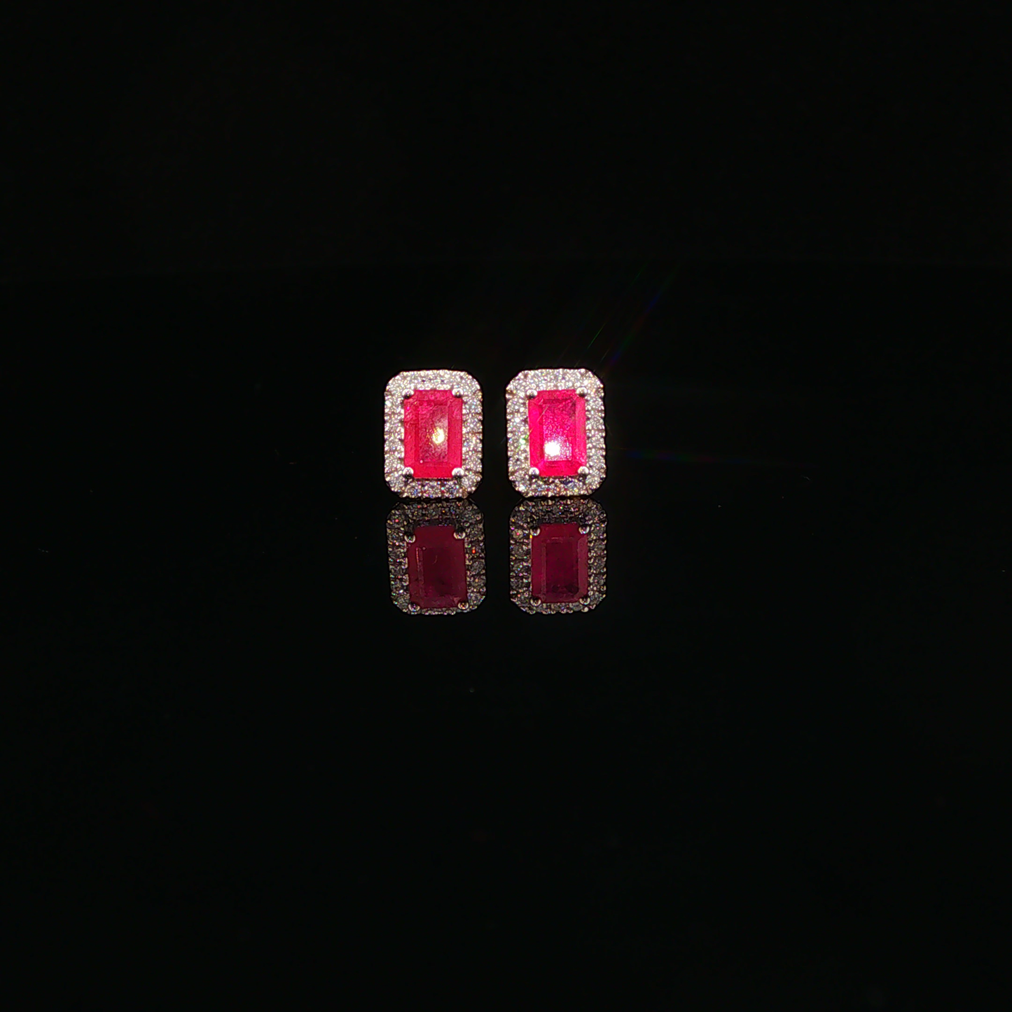 Pigeon Blood Ruby Halo Stud Earrings in White Gold